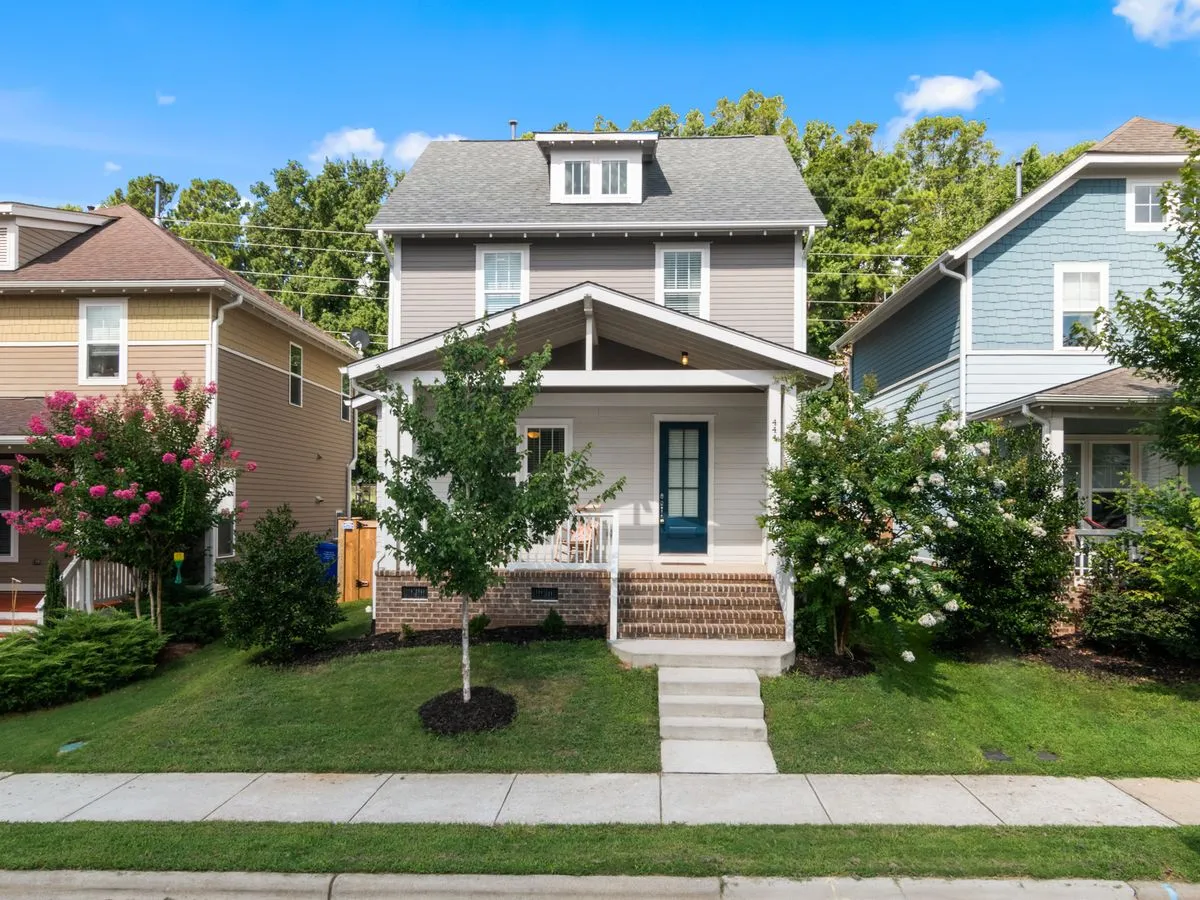 A finished residential exterior illustrating a home renovation website